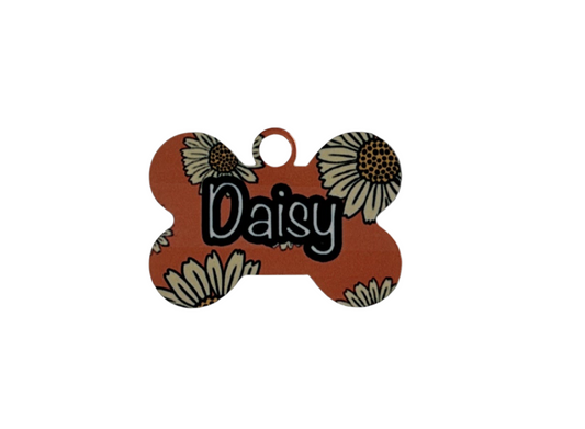 Orange daisy metal tag